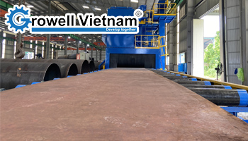 Xử lý rỉ sét thép tấm công nghiệp bằng máy phun bi hiện đại